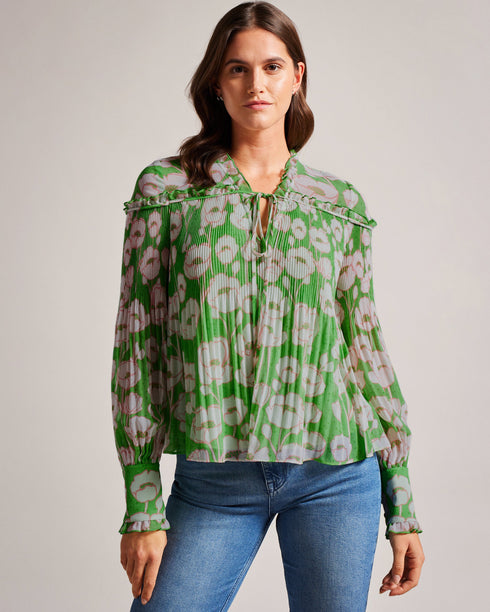 ELLERIE-Tops-Introducing our stunning ELLERIE blouse, featuring a gorgeous poppy print that will add a touch of classic femininity to your wardrobe. A pleated fabric adorned with our exclusive poppy print will brighten up your wardrobe for both casual and dressy occasions. Blouse Poppy print Long blouson sleeves Pleated texture Ruffled V-neck Tie front Boxy fit Amy is 5'9.5" / 1.77m and wears Green in a Ted size 1- Ted Baker Romania